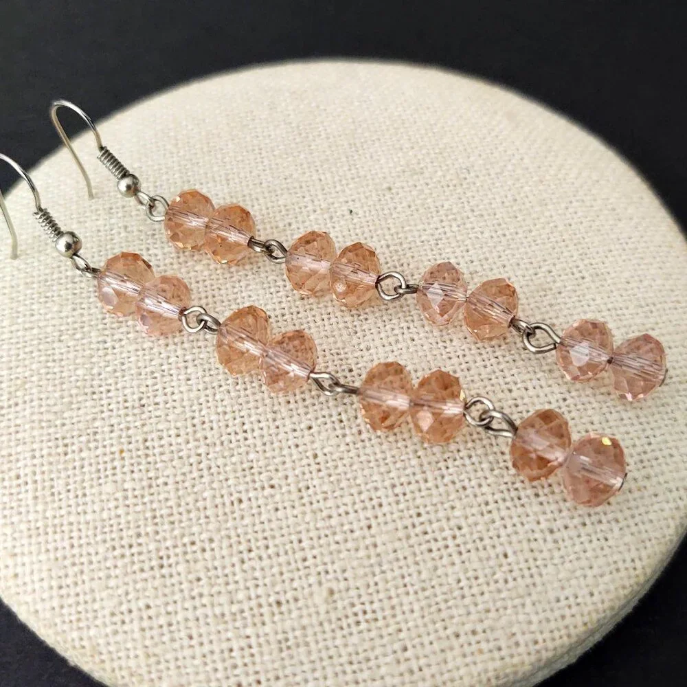Faceted pink glass dangle earrings
